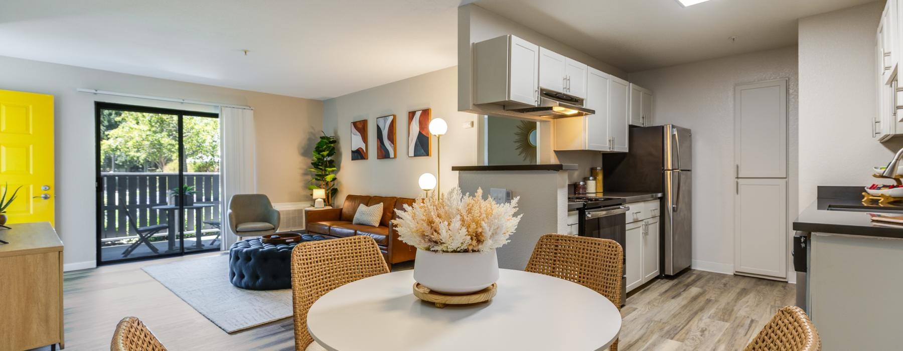 a living room with a dining table