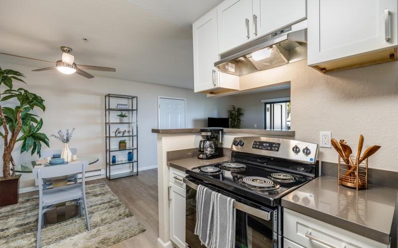 a kitchen with white cabinets
